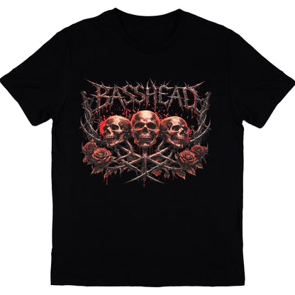 A black short-sleeve crewneck t-shirt featuring a graphic print of three skulls, red roses, crossed swords, and the word 'BASSHEAD' in a spiky metallic font across the chest.